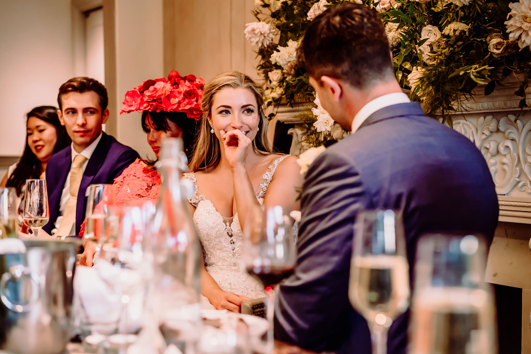 an emotional bride during the grooms speech